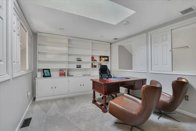 a room with furniture and a window