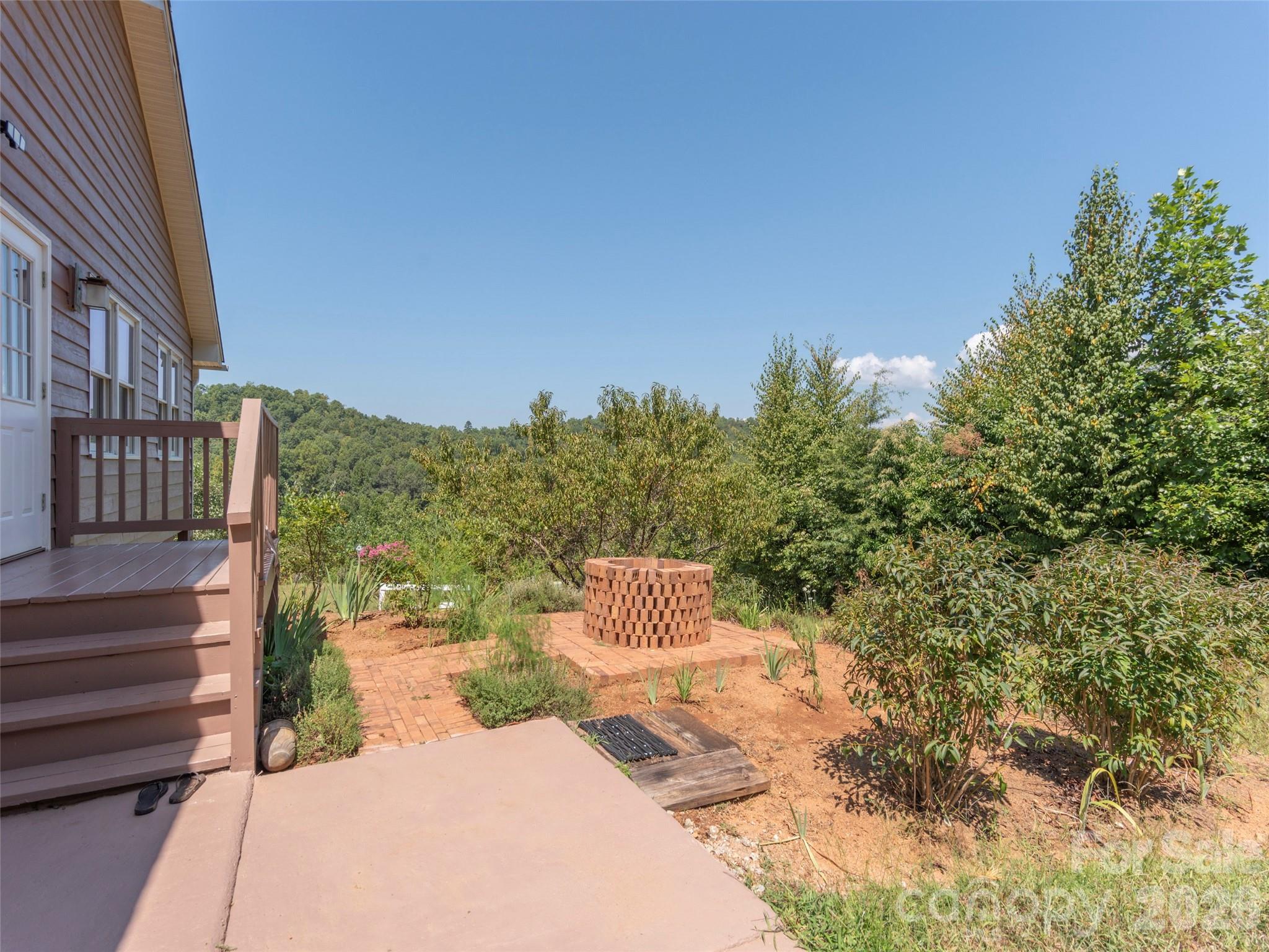 1120 Jacobs Branch Road Franklin, NC 28734 - Photo 29 of 36 a view of a patio in front of a building