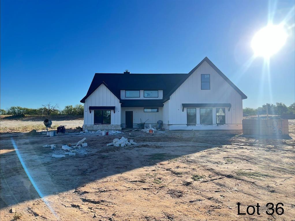 321 Jonny Boy Way Springtown, TX 76082 - Photo 3 of 4 a front view of a house with a yard