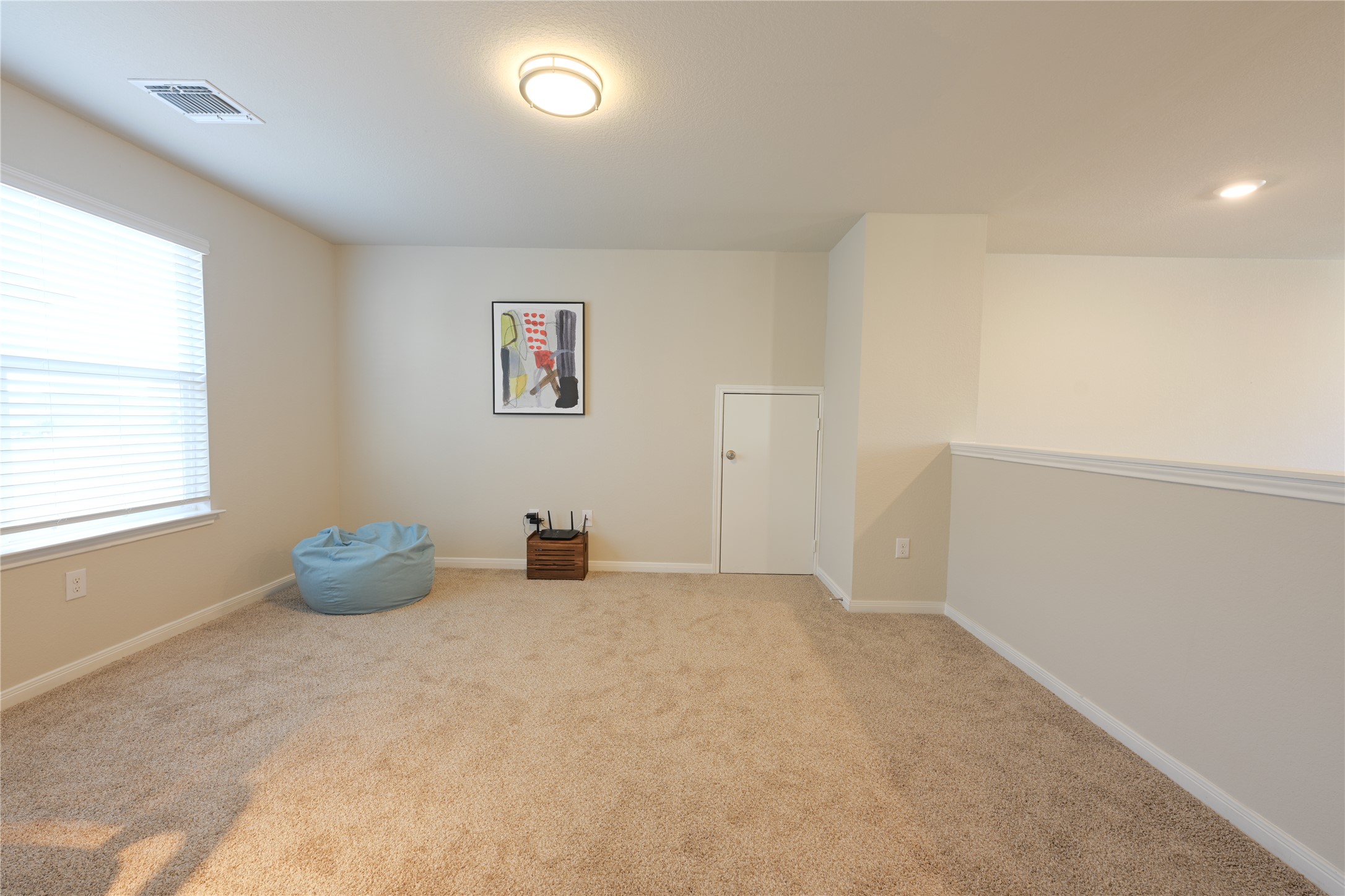 14008 Levy Pflugerville, TX 78660 - Photo 7 of 15 This open loft at 2F can be used a study, game room or family room