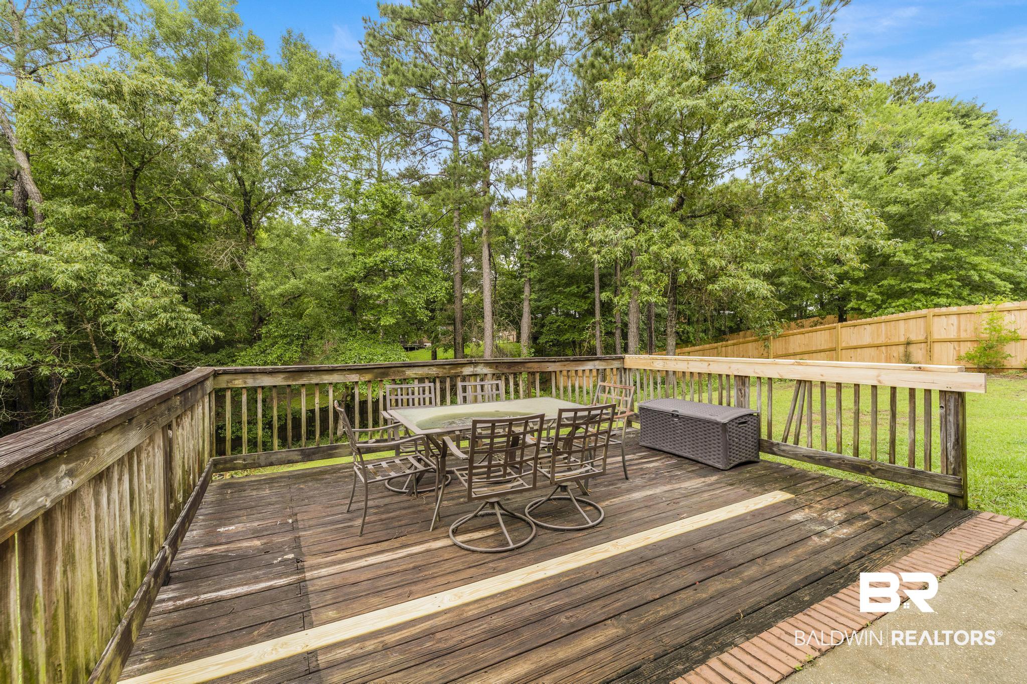 35814 Delvan Lane Bay Minette, AL 36507 - Photo 6 of 53 Wood deck with a spindle railing system