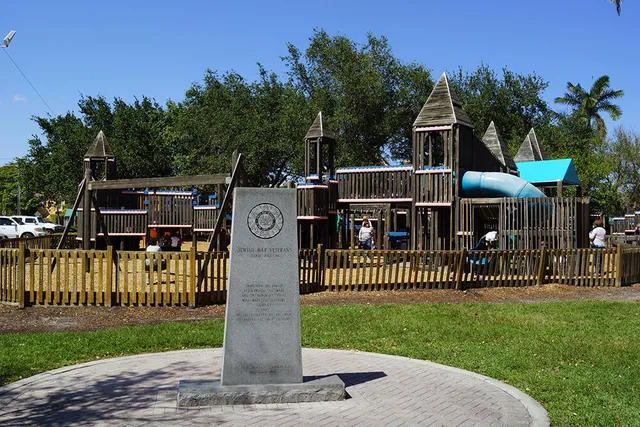 a front view of a house with a yard table and chairs