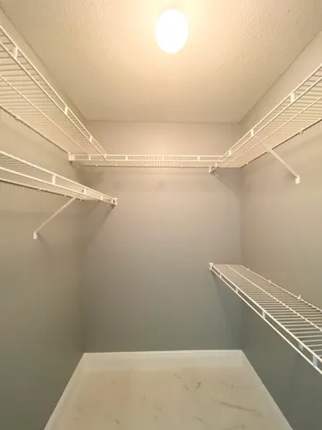 a view of a room with racks on the wall