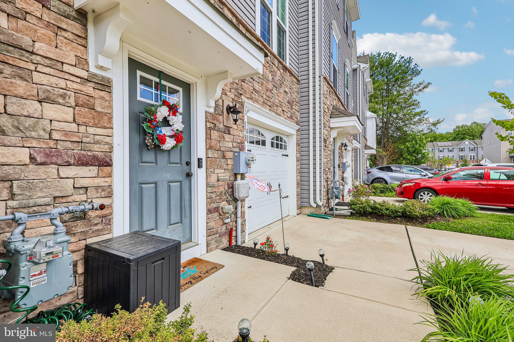 138 Pinnacle Place Sewell, NJ 08080 - Photo 40 of 52 an outdoor space view with a fireplace and potted plants