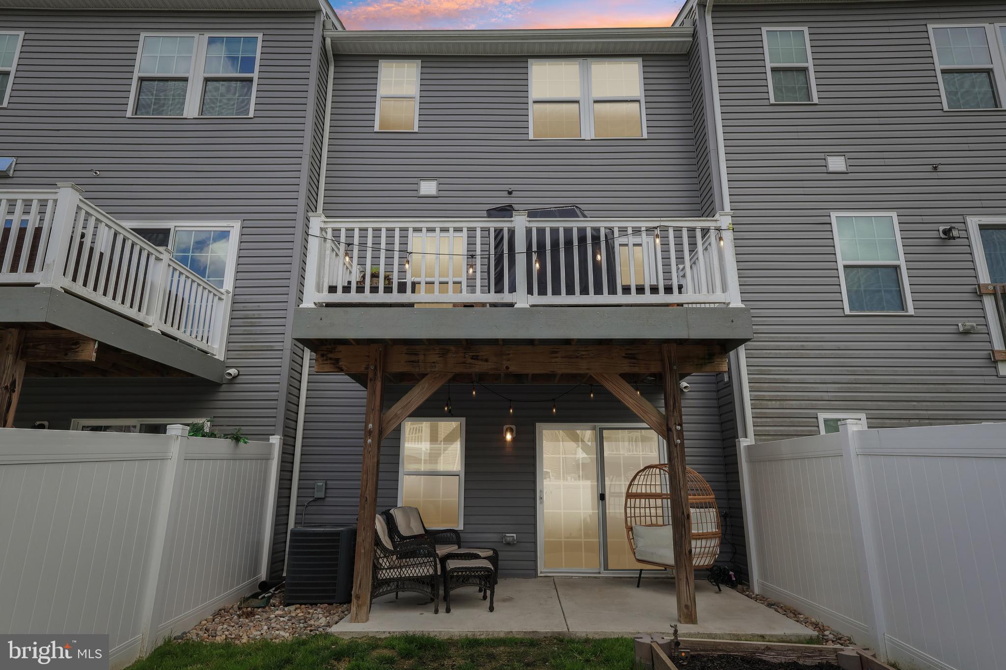 138 Pinnacle Place Sewell, NJ 08080 - Photo 52 of 52 a front view of a house with outdoor seating