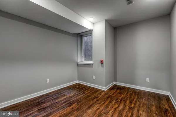 a kitchen with stainless steel appliances granite countertop a refrigerator a stove a sink and a microwave