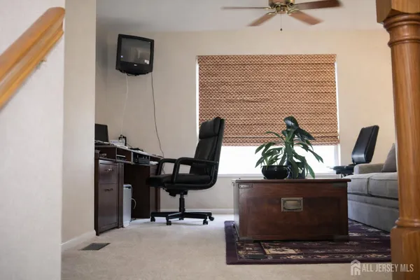 a bathroom with a sink a large mirror and a shower