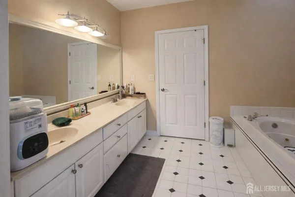 a view of a street with a large trees