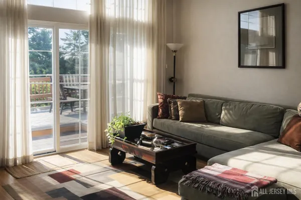 a kitchen with stainless steel appliances a sink a counter space and a window