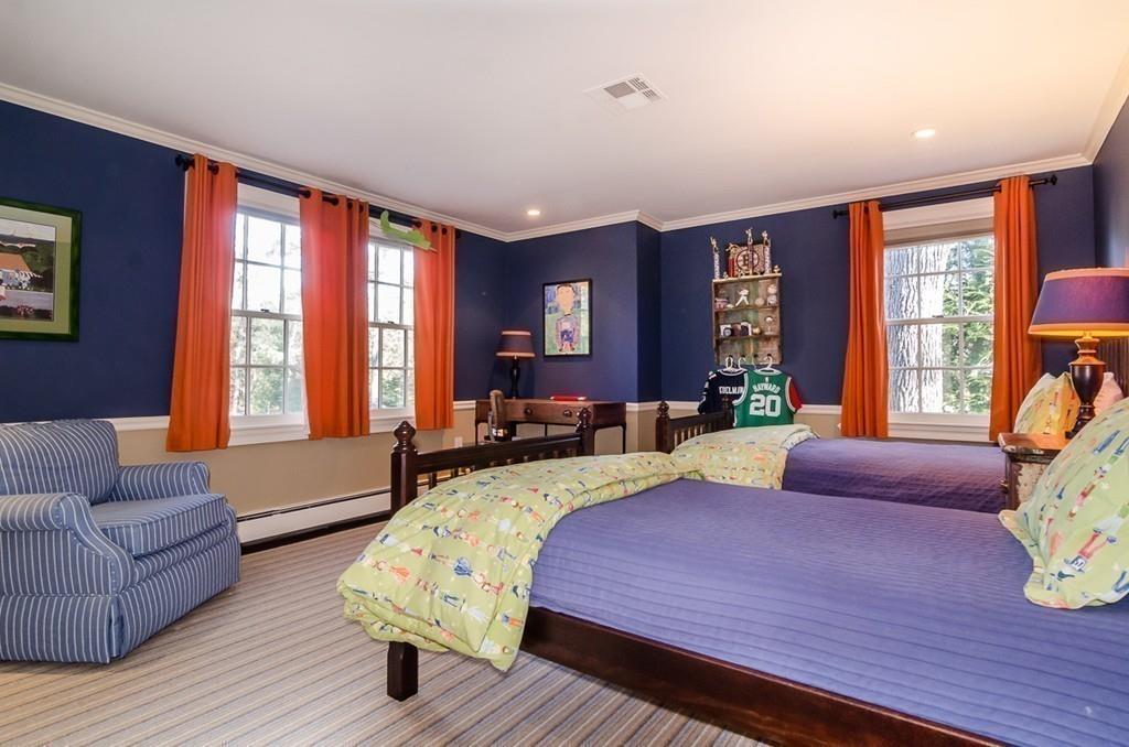 41 Highgate Road Wellesley, MA 02481 - Photo 18 of 24 a bedroom with a bed couch and windows