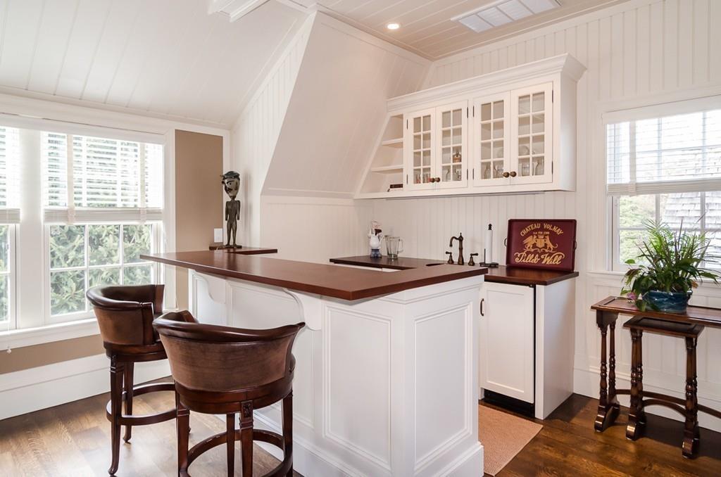 41 Highgate Road Wellesley, MA 02481 - Photo 4 of 24 a view of a dining room with furniture and a window