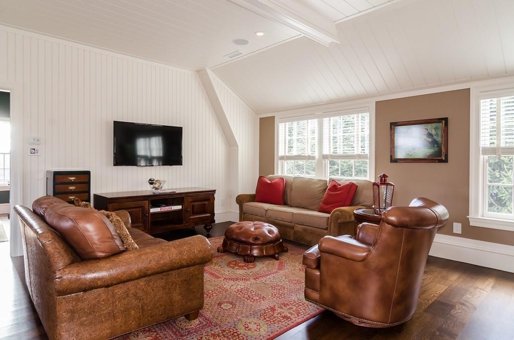 41 Highgate Road Wellesley, MA 02481 - Photo 5 of 24 a living room with furniture and a flat screen tv
