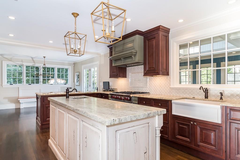 41 Highgate Road Wellesley, MA 02481 - Photo 7 of 24 a kitchen with stainless steel appliances granite countertop a sink a stove and a wooden floors