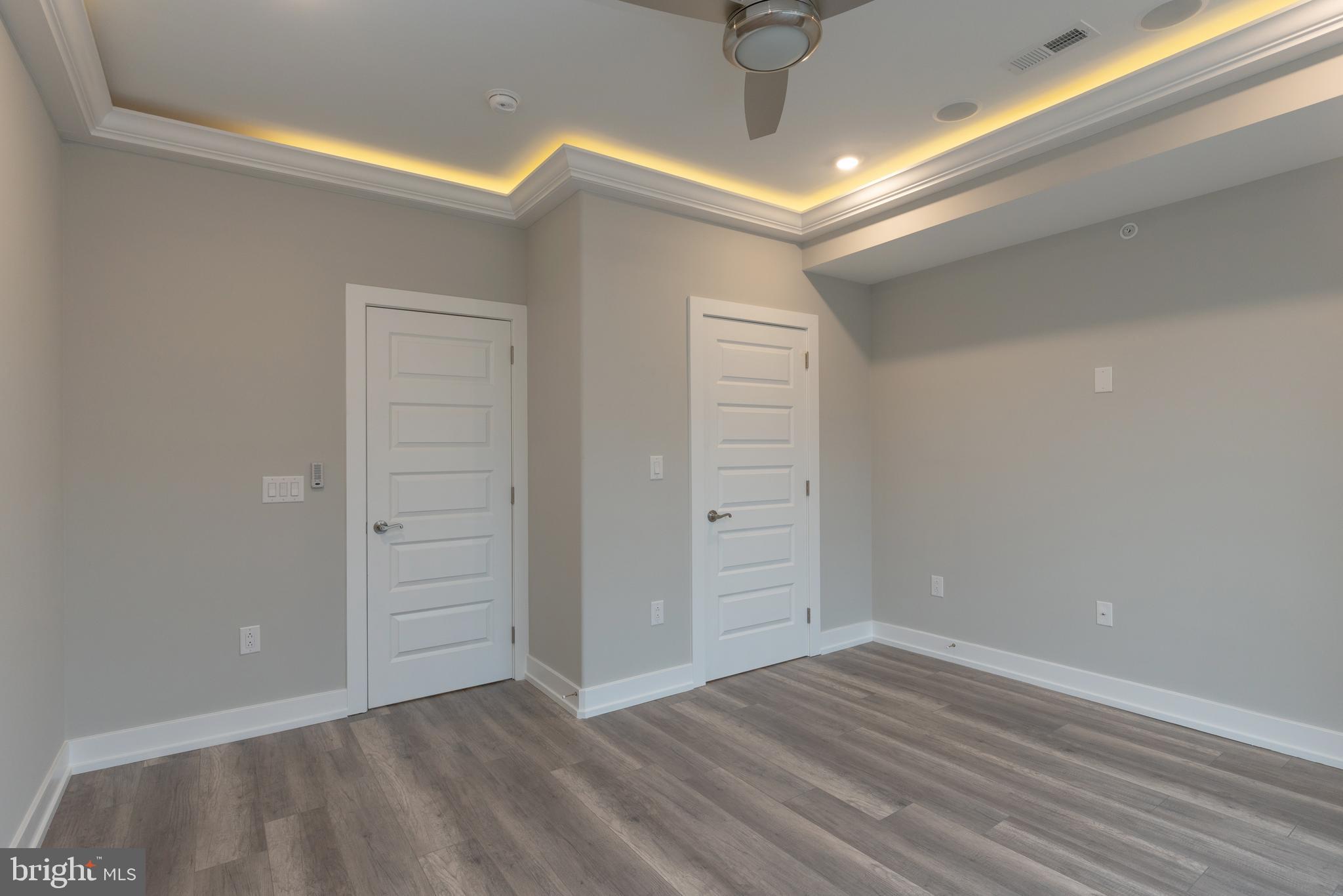 135 West Huntingdon Street, Unit 2 Philadelphia, PA 19133 - Photo 13 of 29 wooden floor in an empty room