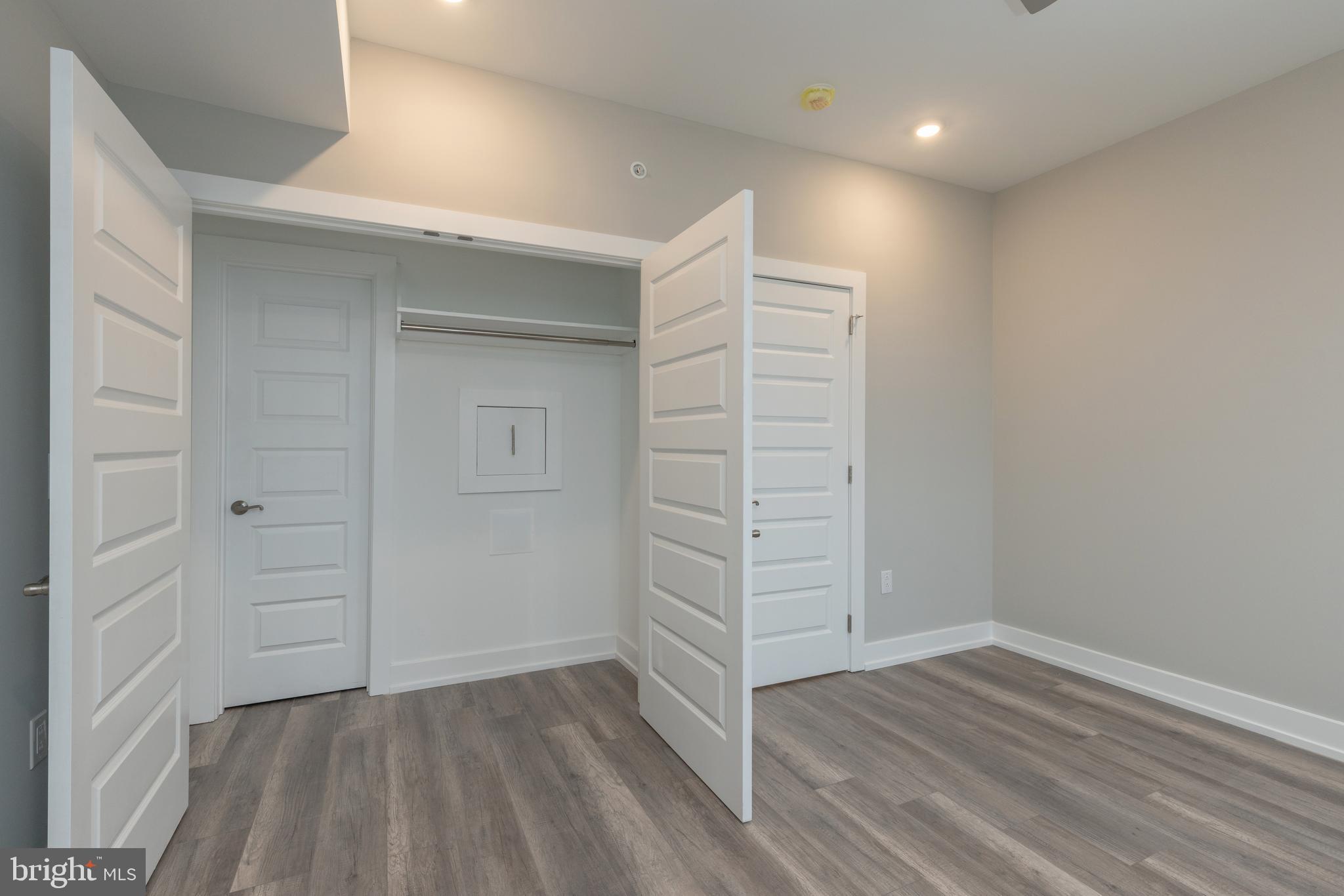 135 West Huntingdon Street, Unit 2 Philadelphia, PA 19133 - Photo 17 of 29 wooden floor in an empty room