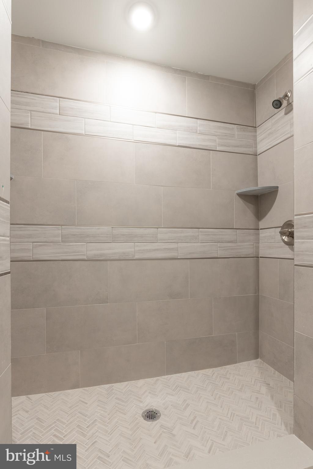 135 West Huntingdon Street, Unit 2 Philadelphia, PA 19133 - Photo 20 of 29 a bathroom with a shower