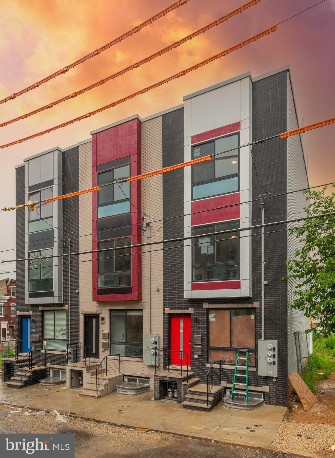 135 West Huntingdon Street, Unit 2 Philadelphia, PA 19133 - Photo 29 of 29 a front view of a building with street