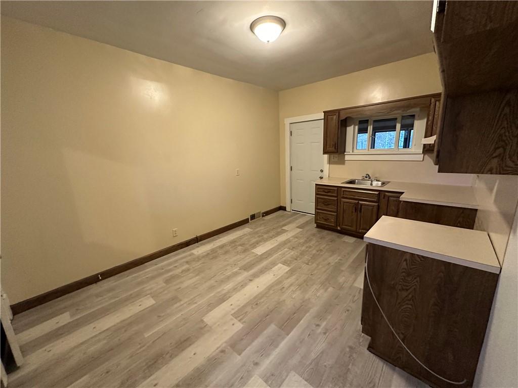 615 Division Street Monessen, PA 15062 - Photo 5 of 15 a room with furniture and window