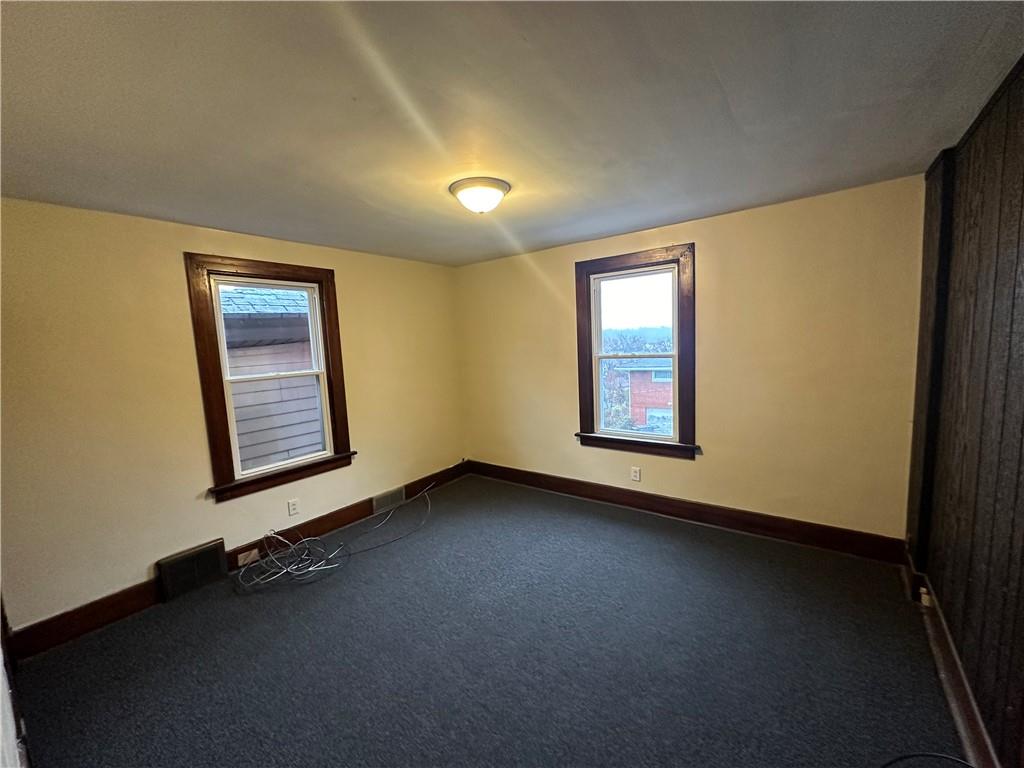 615 Division Street Monessen, PA 15062 - Photo 10 of 15 an empty room with a window