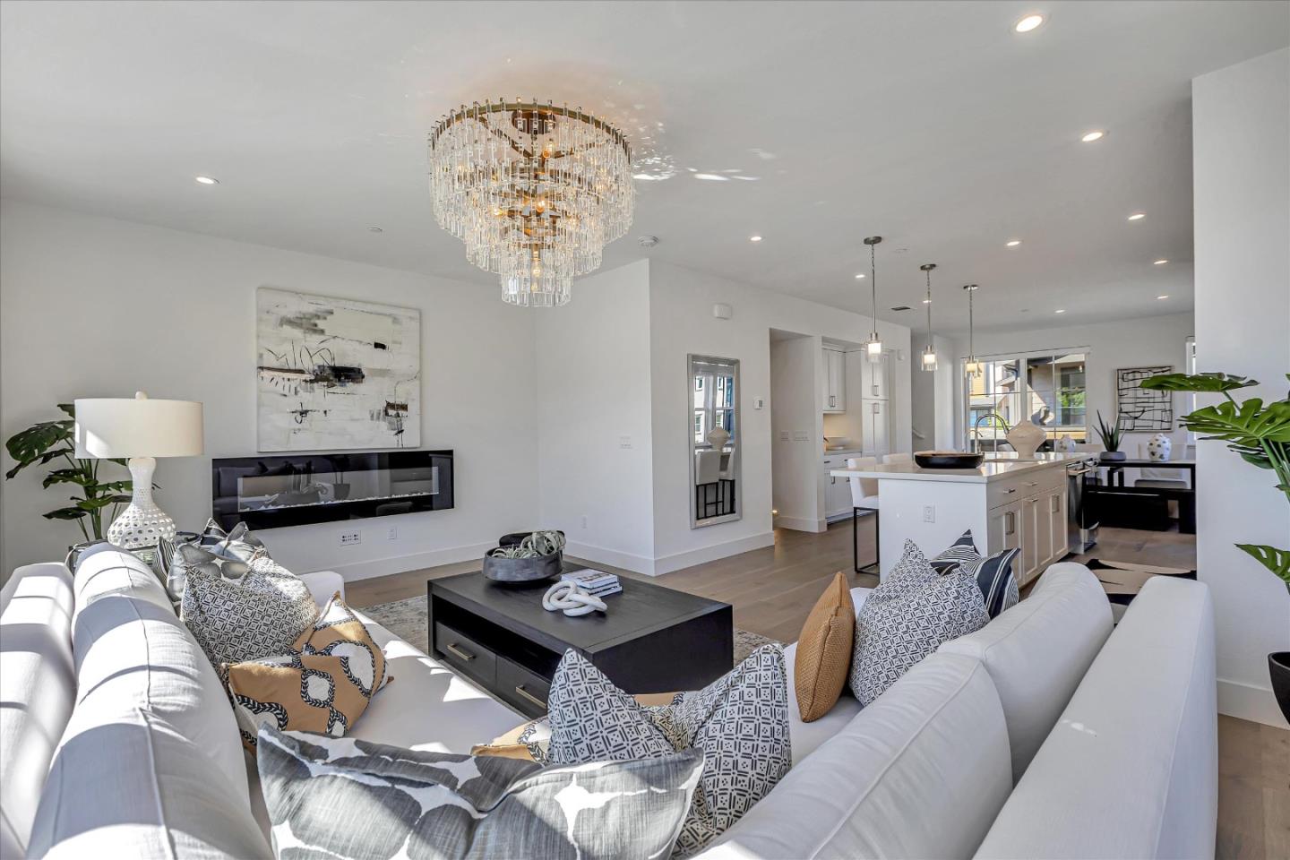 2032 Thea Circle Mountain View, CA 94043 - Photo 1 of 29 a living room with furniture kitchen view and a chandelier