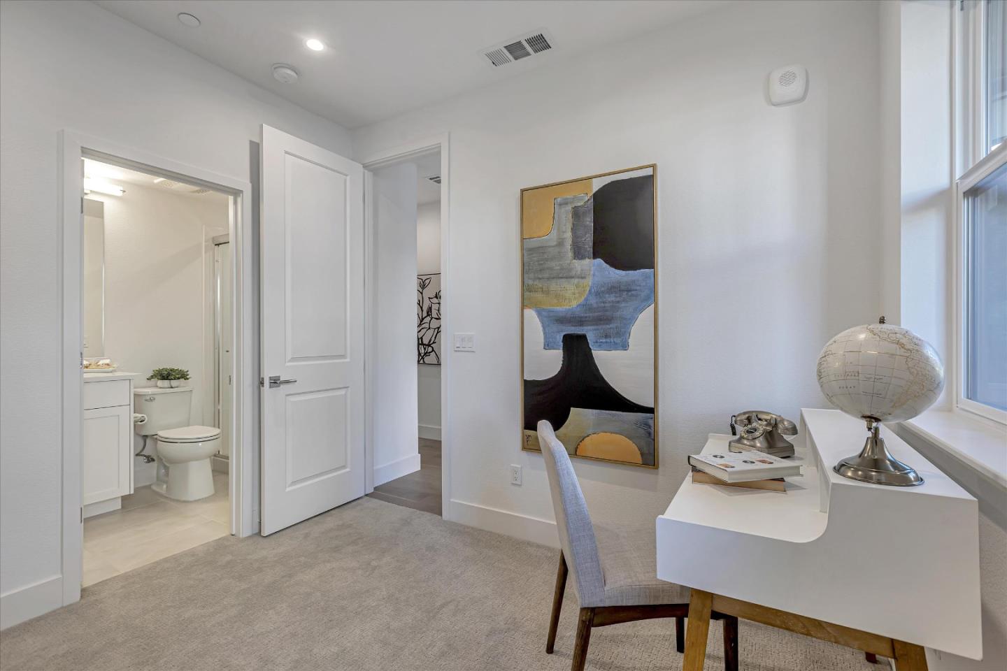 2032 Thea Circle Mountain View, CA 94043 - Photo 12 of 29 a view of a room that has a table and chairs in it