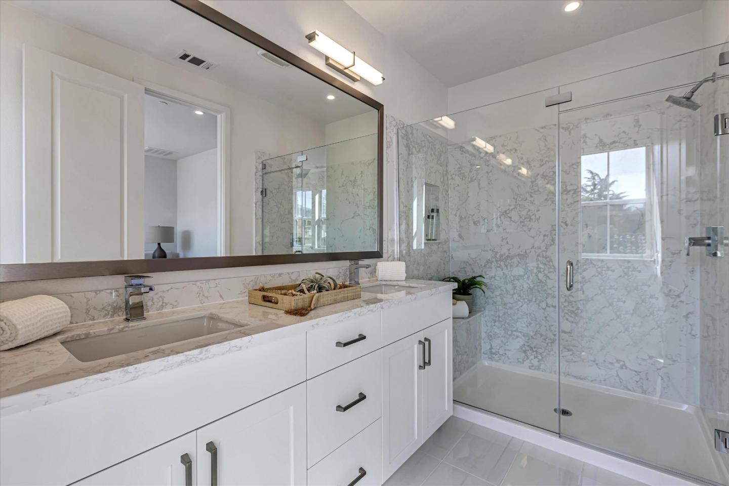 2032 Thea Circle Mountain View, CA 94043 - Photo 15 of 29 a bathroom with a double vanity sink mirror and shower