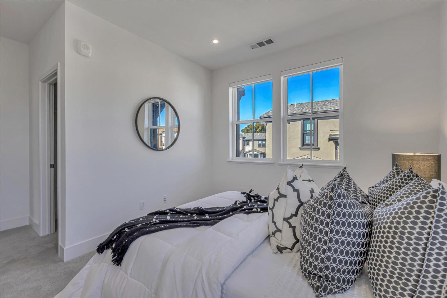 2032 Thea Circle Mountain View, CA 94043 - Photo 18 of 29 a bedroom with a bed and a window