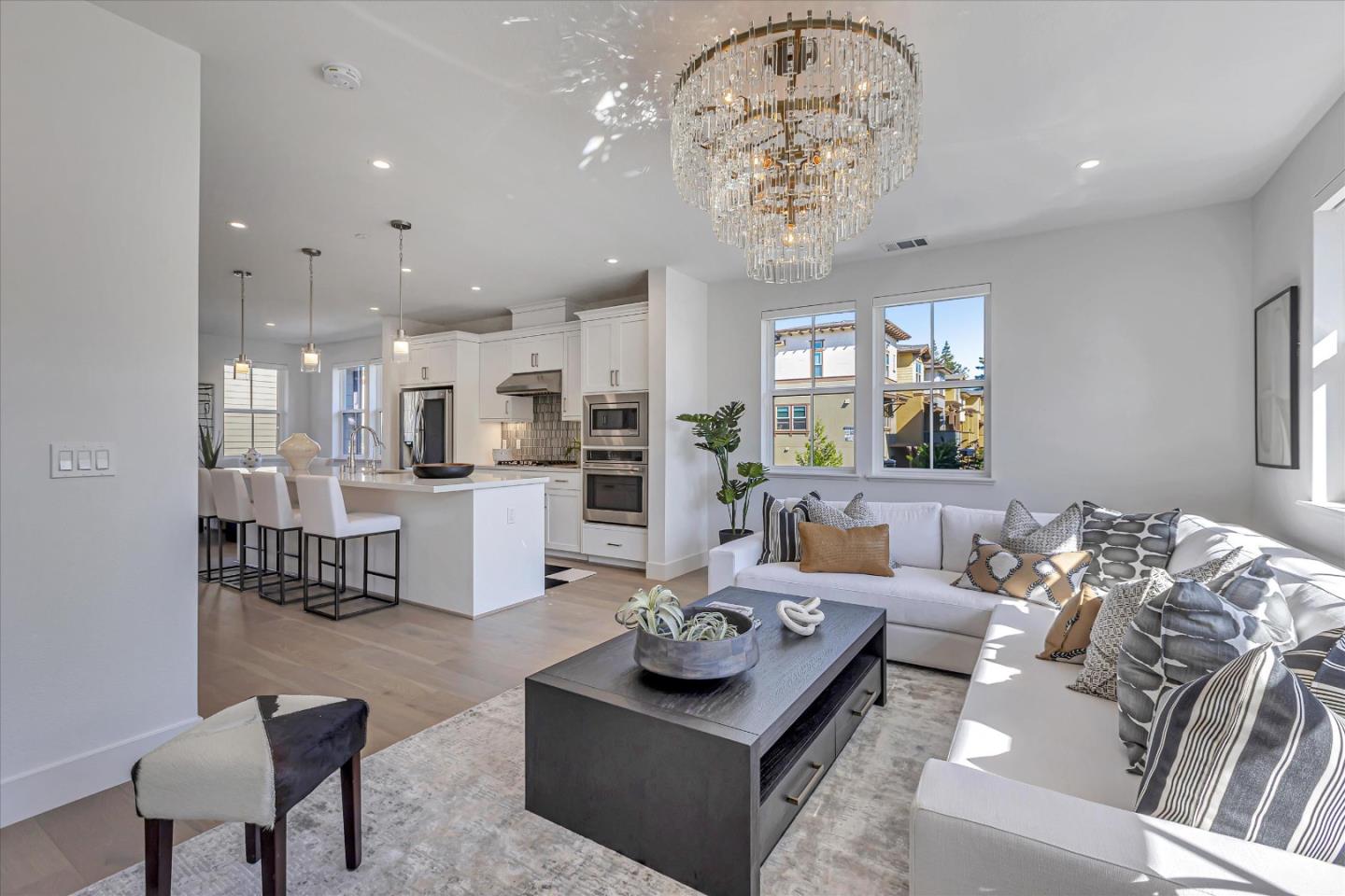 2032 Thea Circle Mountain View, CA 94043 - Photo 4 of 29 a living room with furniture and a chandelier
