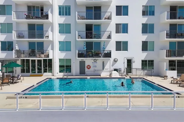 a kitchen with a table and chairs in it