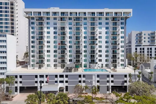 a view of a building with a garden