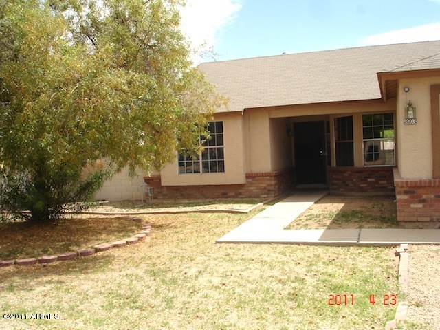 8903 West Coronado Road Phoenix, AZ 85037 - Photo 1 of 12 Front