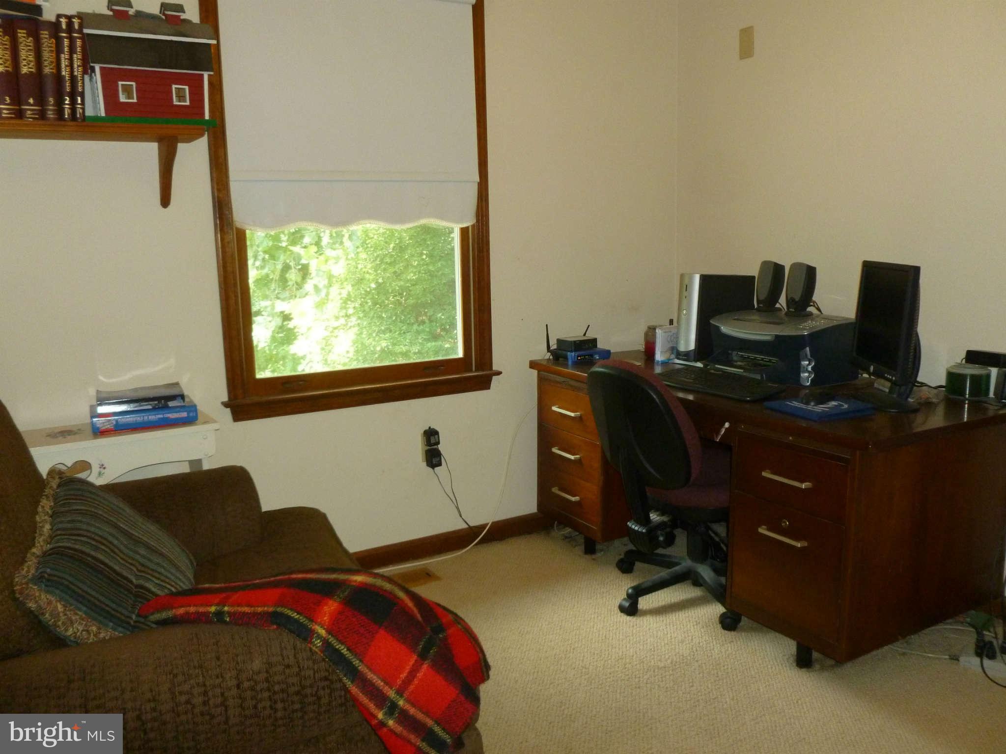 5762 Howellsville Road Front Royal, VA 22630 - Photo 12 of 22 a bedroom with a workspace