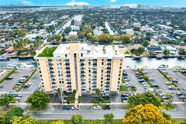 an aerial view of residential building and lake view