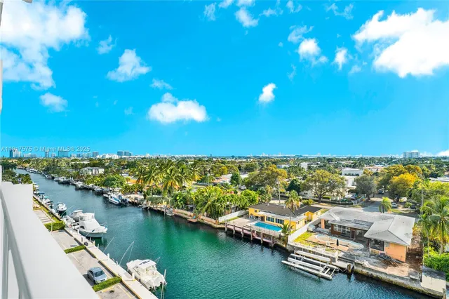 a view of a city with a lake