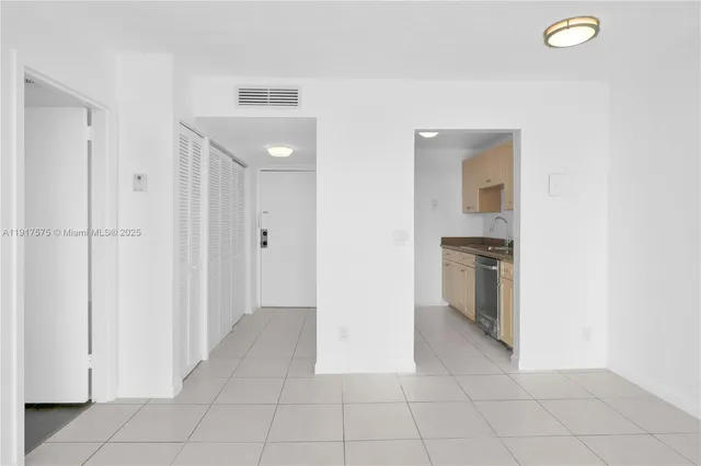 a view of a kitchen with a sink