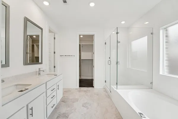 a bathroom with a sink toilet and vanity