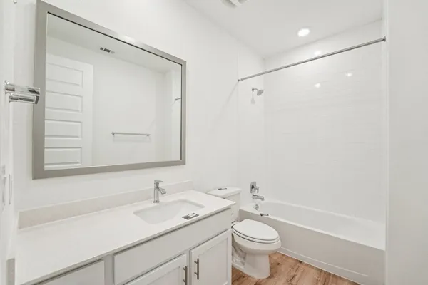 a spacious bathroom with a shower tub double and sink