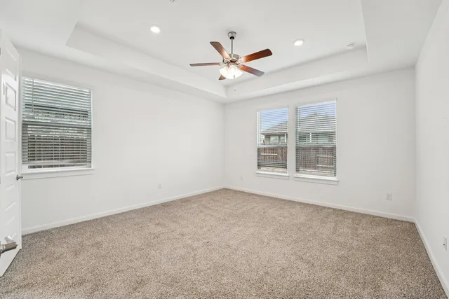 an empty room with closet area