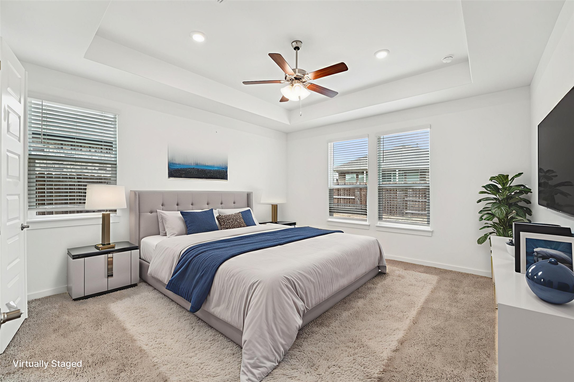 2233 Bravo Pass Leander, TX 78641 - Photo 4 of 33 Bedroom featuring a tray ceiling, carpet flooring, ceiling fan, and recessed lighting. Virtual Staged