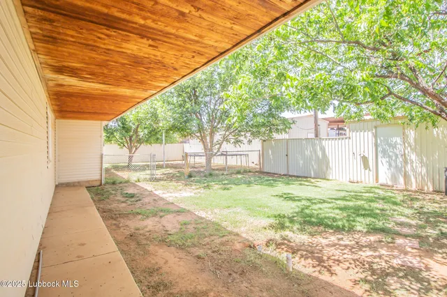 a view of a yard with a trees