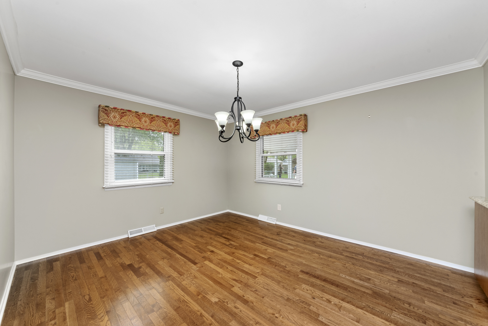 30 Pickford Road Montgomery, IL 60538 - Photo 5 of 24 a view of a room with windows and ceiling fan
