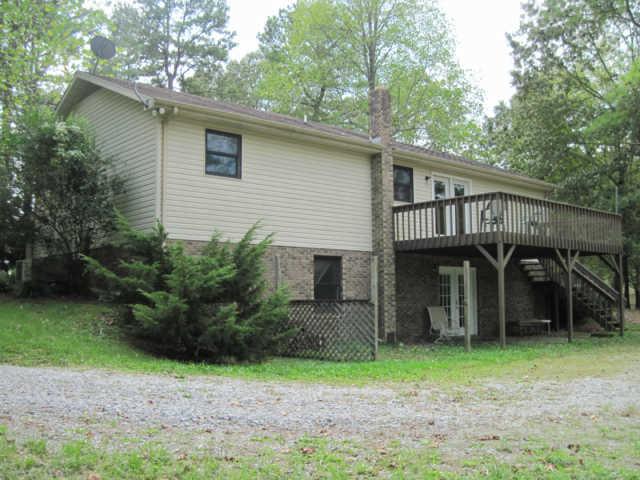 141 Sullivan Road Dickson, TN 37055 - Photo 8 of 12 French doors from dining area lead to a spacious 12 x 21 deck.