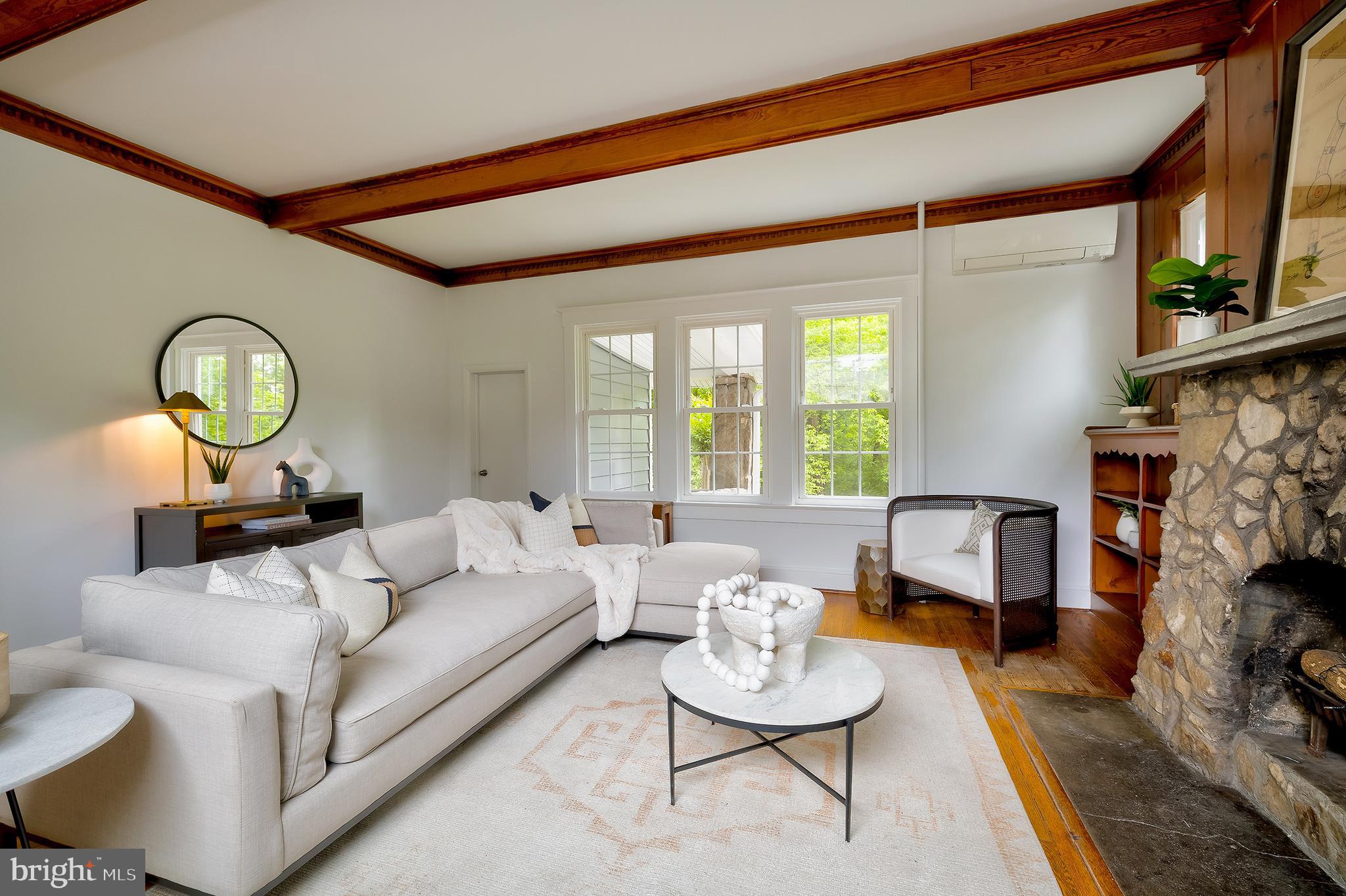 2925 Covington Road Silver Spring, MD 20910 - Photo 11 of 70 a living room with fireplace furniture and a large window