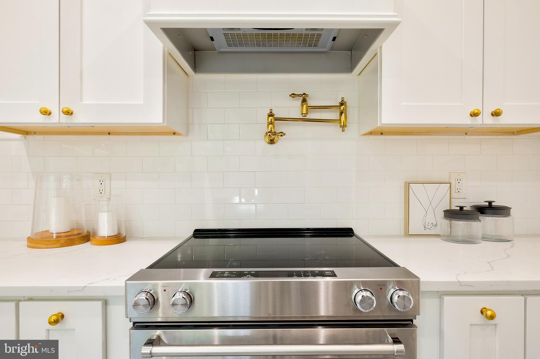 2925 Covington Road Silver Spring, MD 20910 - Photo 13 of 70 a stove top oven sitting inside of a kitchen