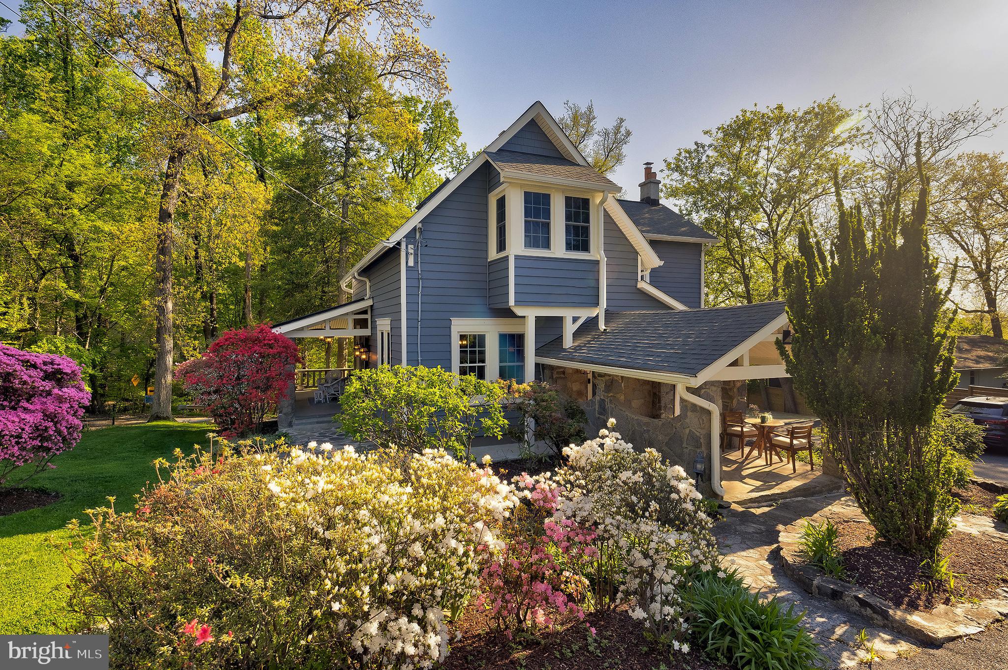 2925 Covington Road Silver Spring, MD 20910 - Photo 2 of 70 a front view of a house with garden