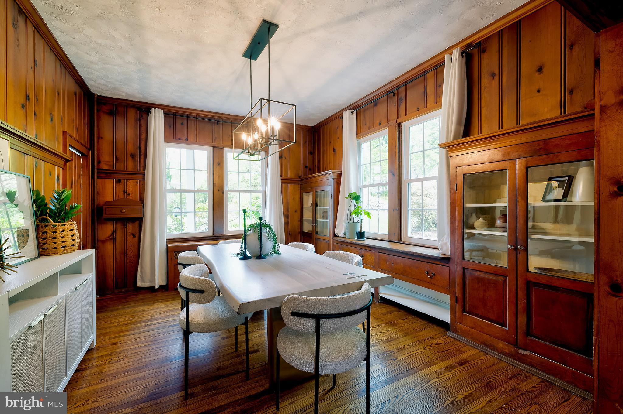 2925 Covington Road Silver Spring, MD 20910 - Photo 22 of 70 a view of a dining room with furniture window and wooden floor