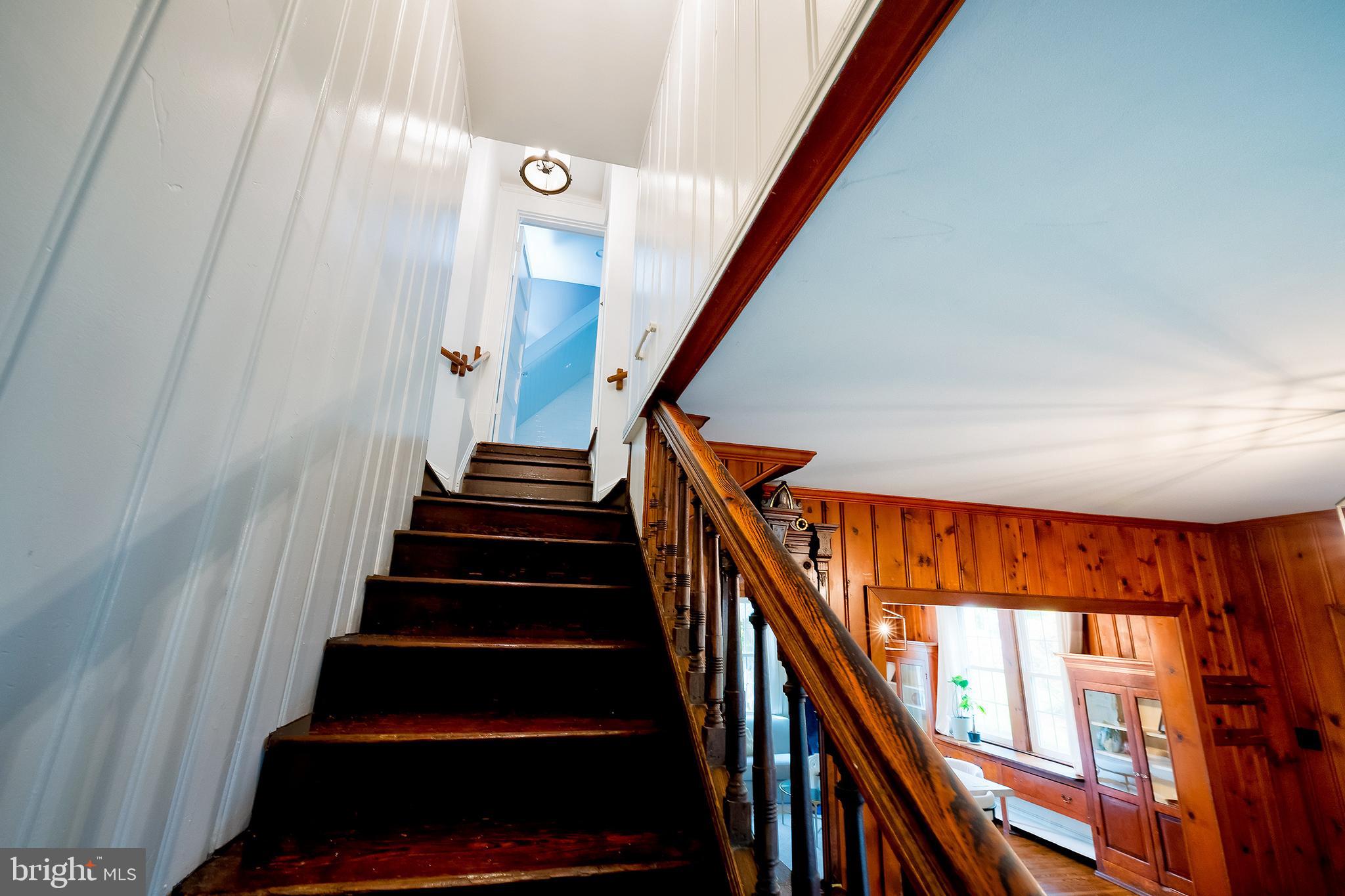 2925 Covington Road Silver Spring, MD 20910 - Photo 30 of 70 a view of staircase with wooden floor and a window