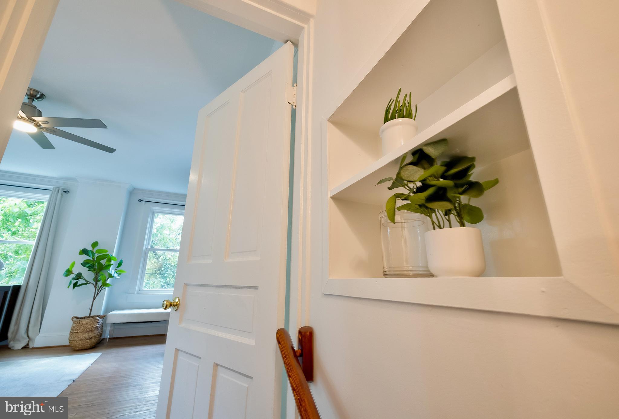2925 Covington Road Silver Spring, MD 20910 - Photo 31 of 70 a view of a potted plant sitting in a kitchen next to a window