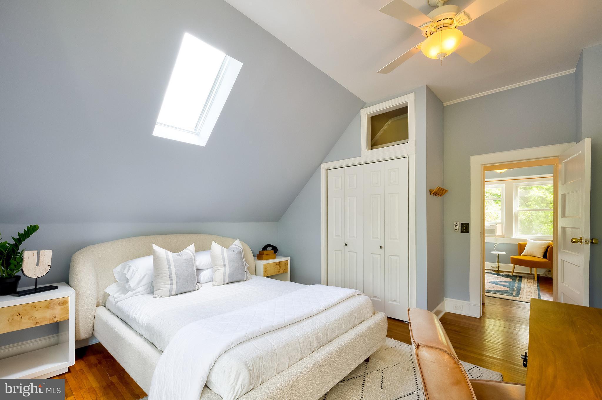 2925 Covington Road Silver Spring, MD 20910 - Photo 44 of 70 a bedroom with a bed and a chandelier