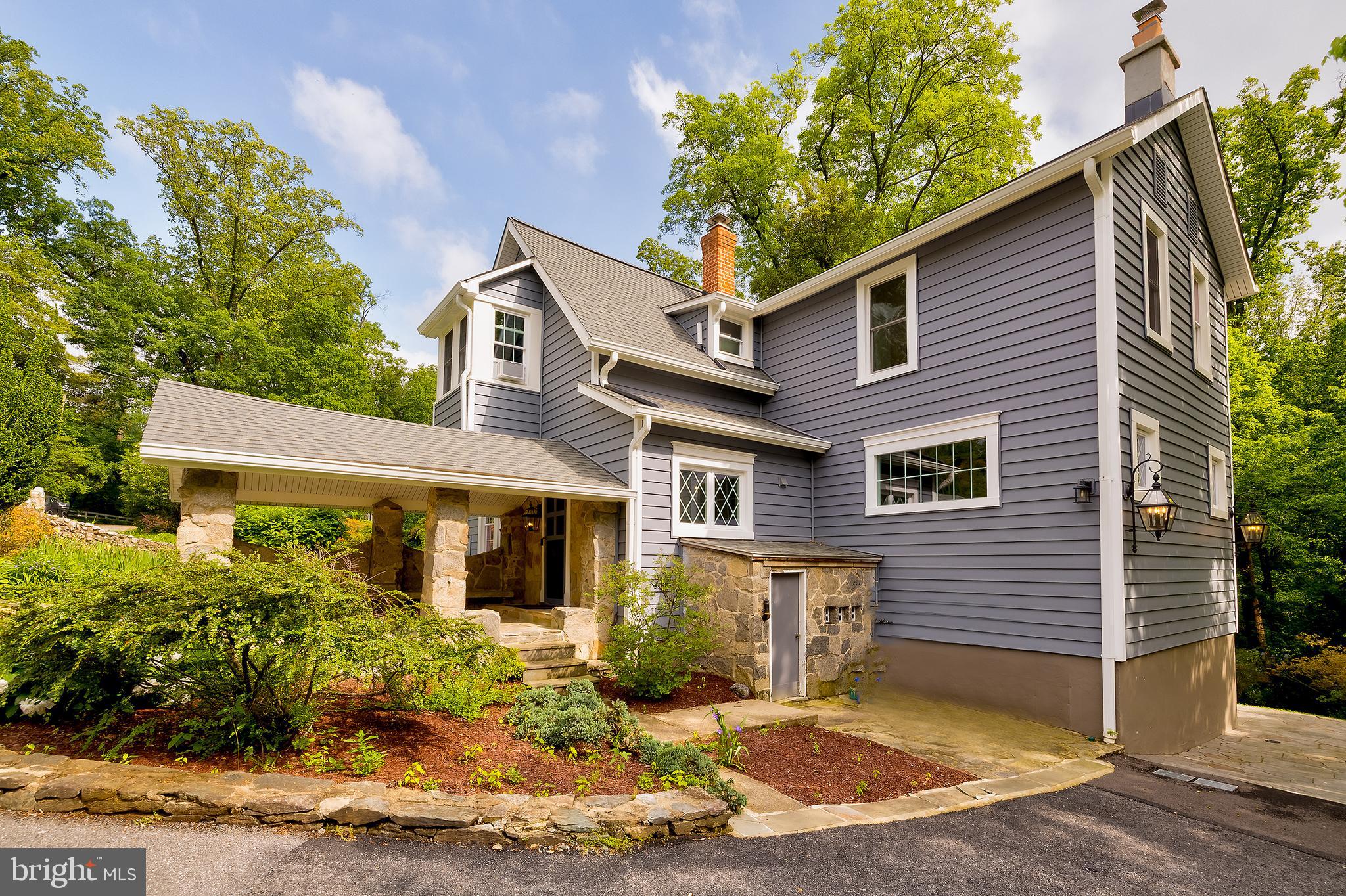 2925 Covington Road Silver Spring, MD 20910 - Photo 58 of 70 a front view of a house with garden
